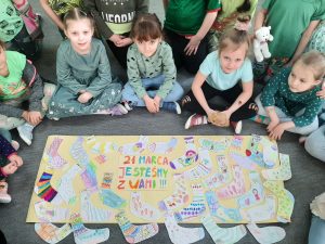 Plakat ,,Jesteśmy z Wami''- łączymy się z osobami z Zespołem Downa